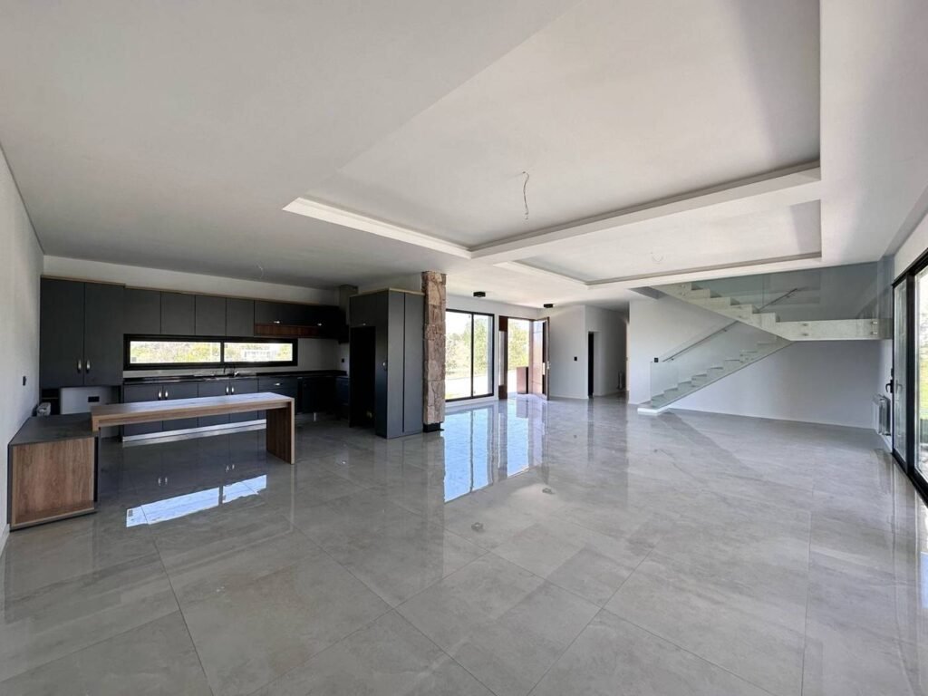 Casa A9 en Altos de Carlos Paz: cocina y estar integrados