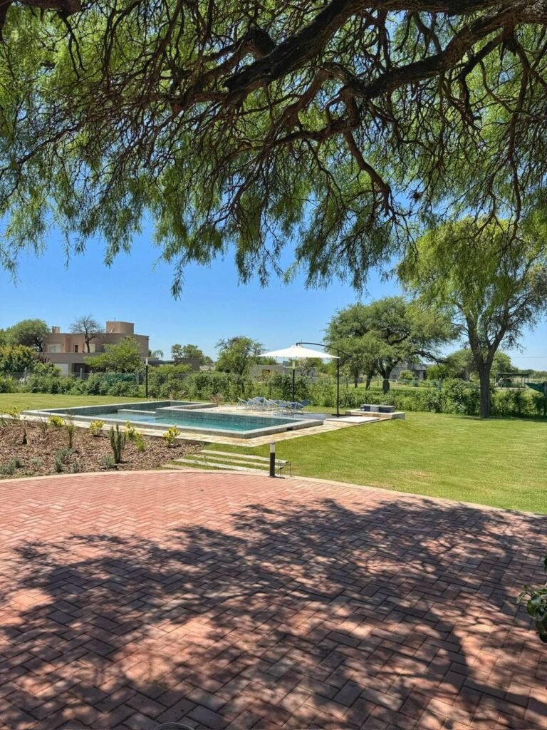 Casa E102 en Estación del Carmen, Malagueño: parque y pileta