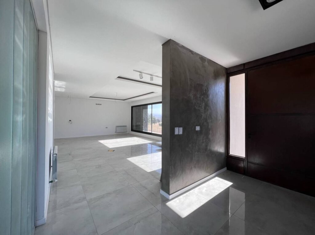 Casa G21 en Carlos Paz Golf Country Club: estar