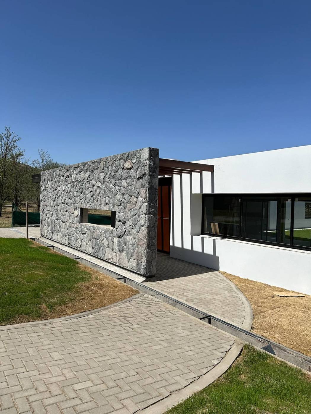 Casa G9 en Carlos Paz Golf Country Club, fachada